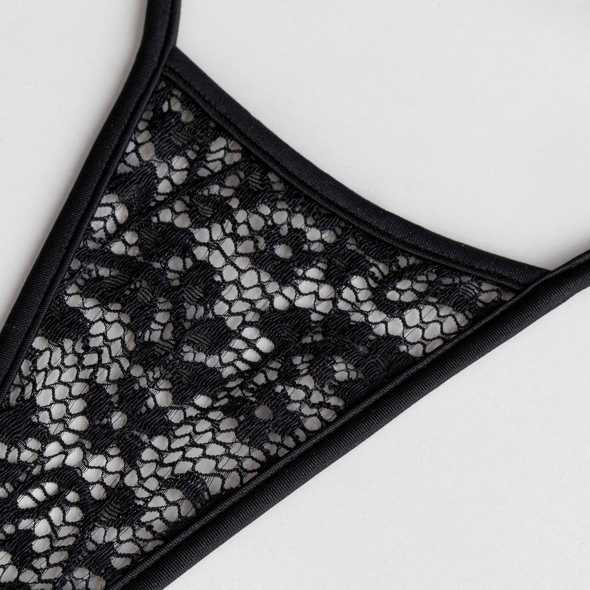Schwarze französische Spitze vom String - black lace from France of g string